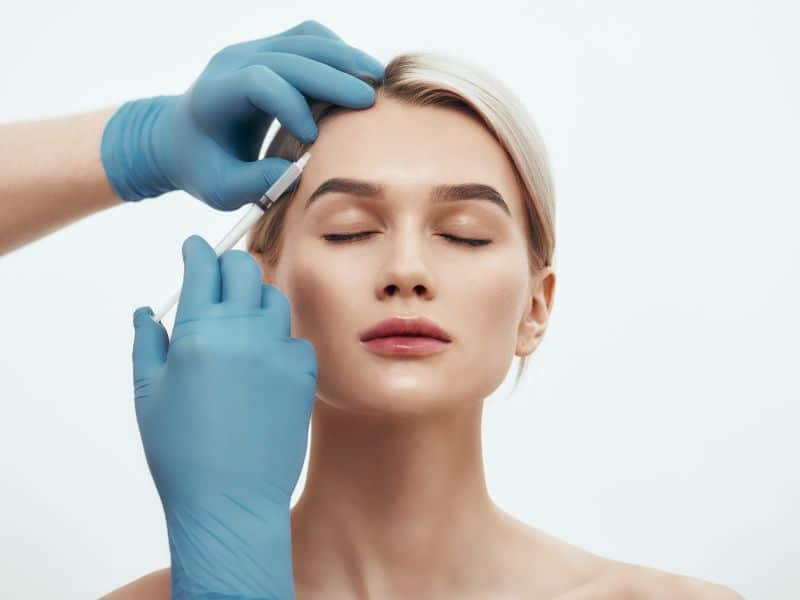 A woman receiving Botox injections from a neurologist in the U.S. Virgin Islands.
