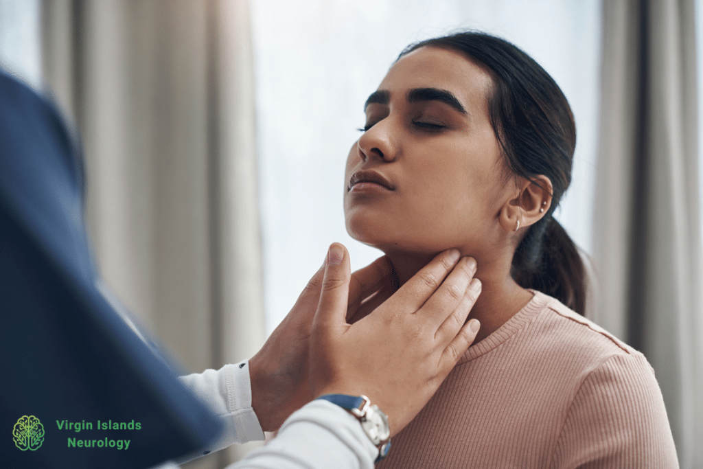 A woman with chronic neck pain being examined by a doctor in the U.S Virgin Islands.