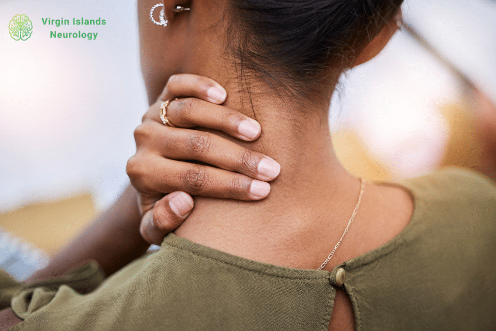 A woman suffering from neck pain in the U.S Virgin Islands.